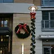 Commercial holiday lighting installation on a business